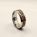 Silver ring on a light gray background
